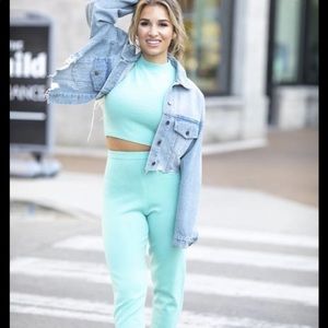 Kittenish blue sleeveless sweater set